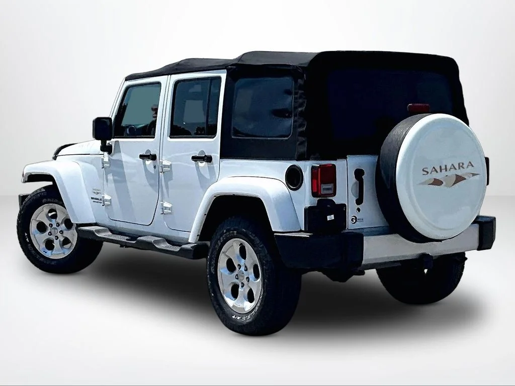 Used 2015 White Jeep Unlimited Sahara image 14