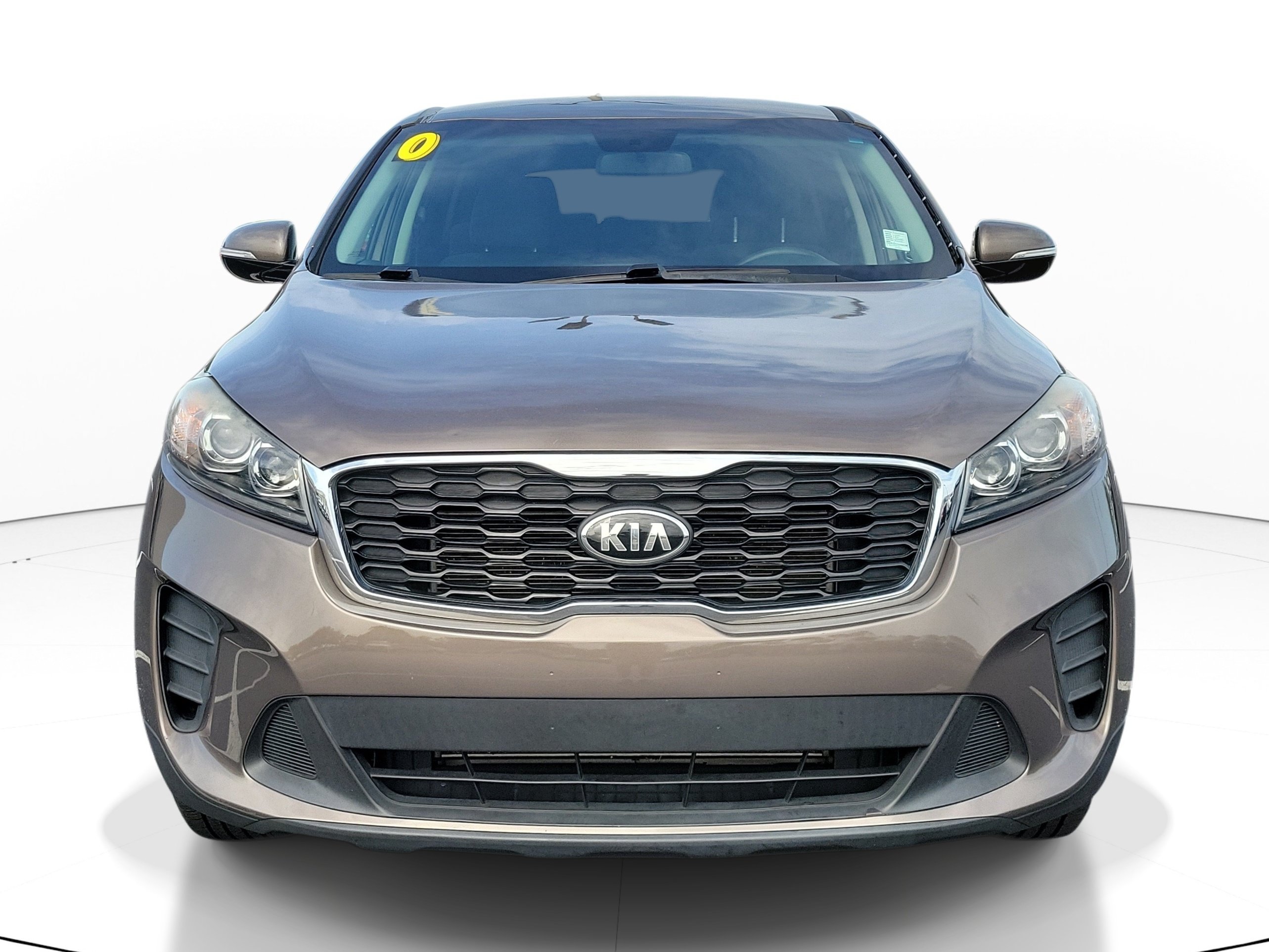 Used 2020 Dragon Brown Kia LX image 1