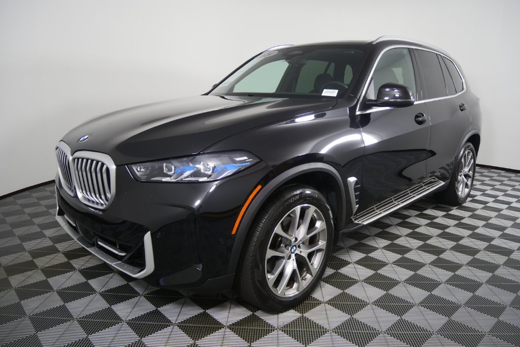 Certified Used 2024 Black Sapphire Metallic BMW sDrive40i image 8