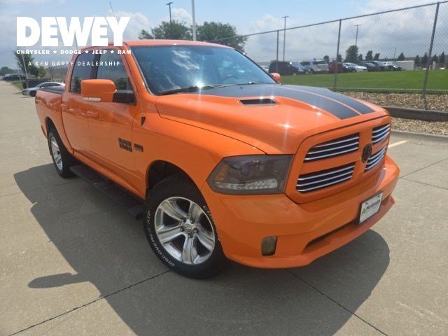 Used 2015 Ignition Orange Clear Coat Ram Sport image 1