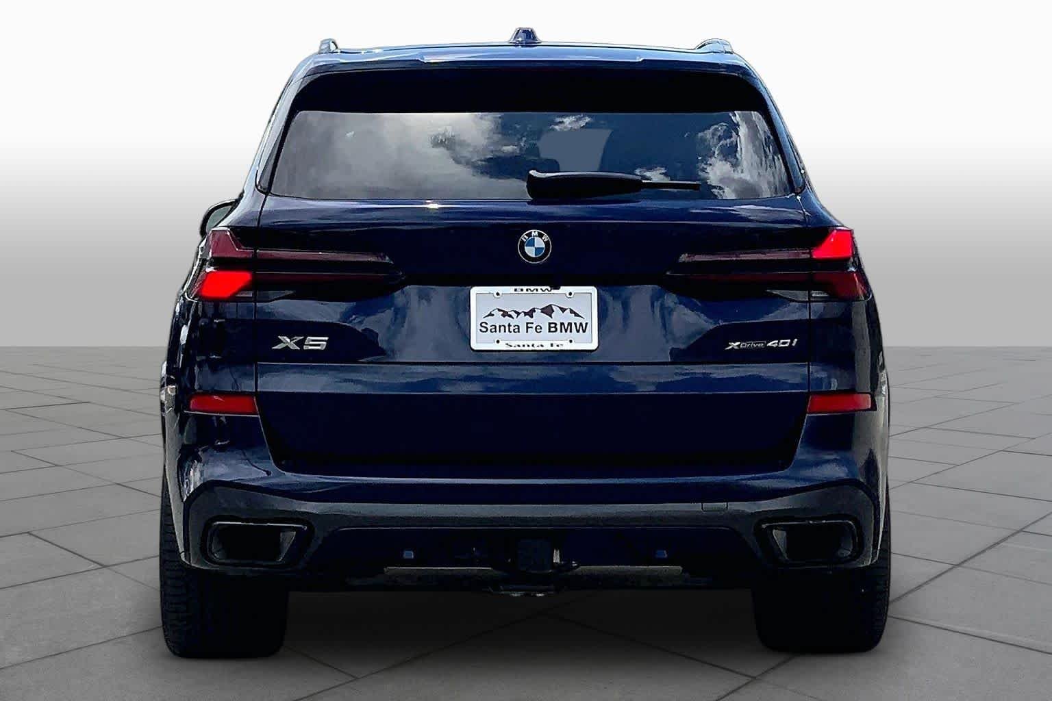 Used 2024 Tanzanite Blue II Metallic BMW xDrive40i image 4