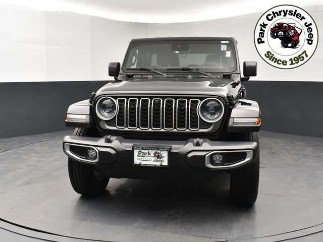 Used 2024 Jeep Wrangler 4-Door Sahara with VIN 1C4PJXEG3RW247825 for sale in Burnsville, Minnesota