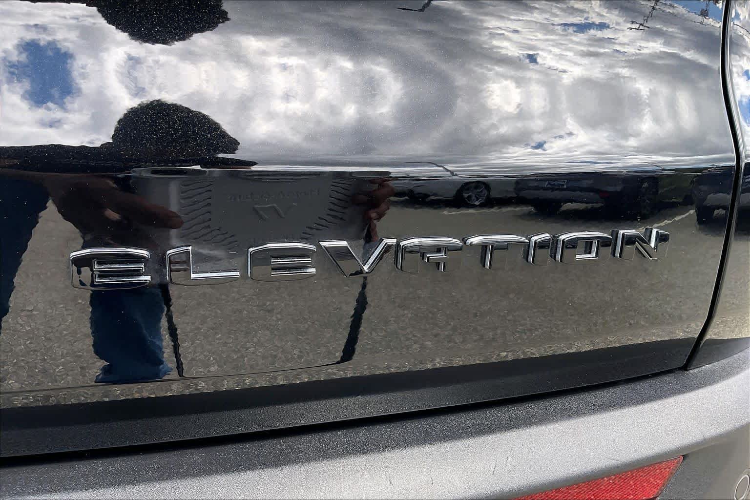 Used 2025 Ebony Twilight Metallic GMC AWD Elevation image 9