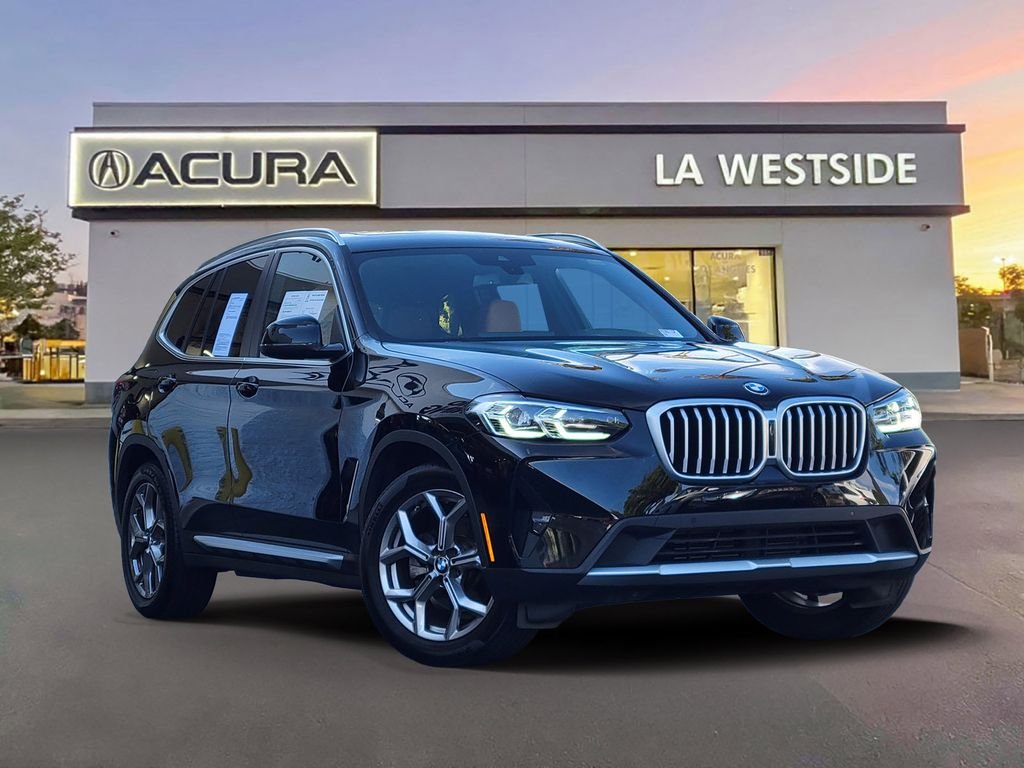 Used 2024 Jet Black BMW sDrive30i image 1