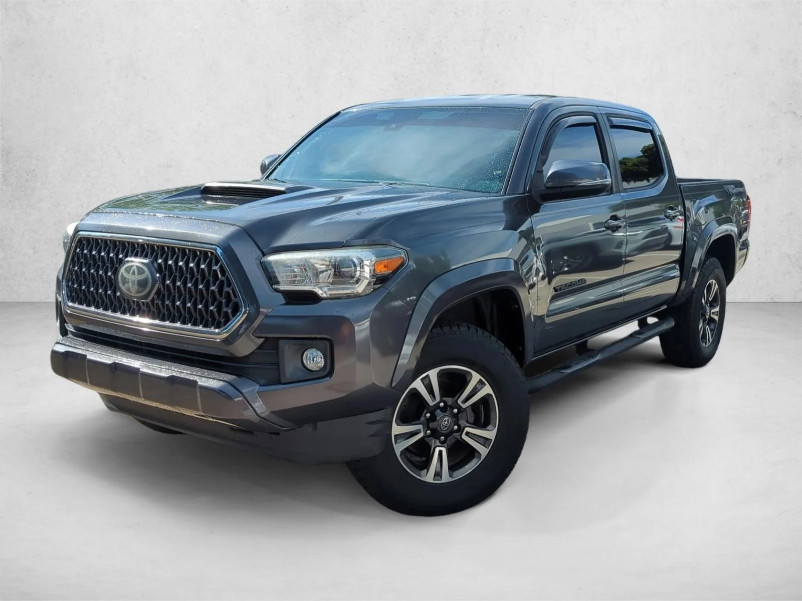 Used 2019 Magnetic Gray Metallic Toyota TRD Sport image 1
