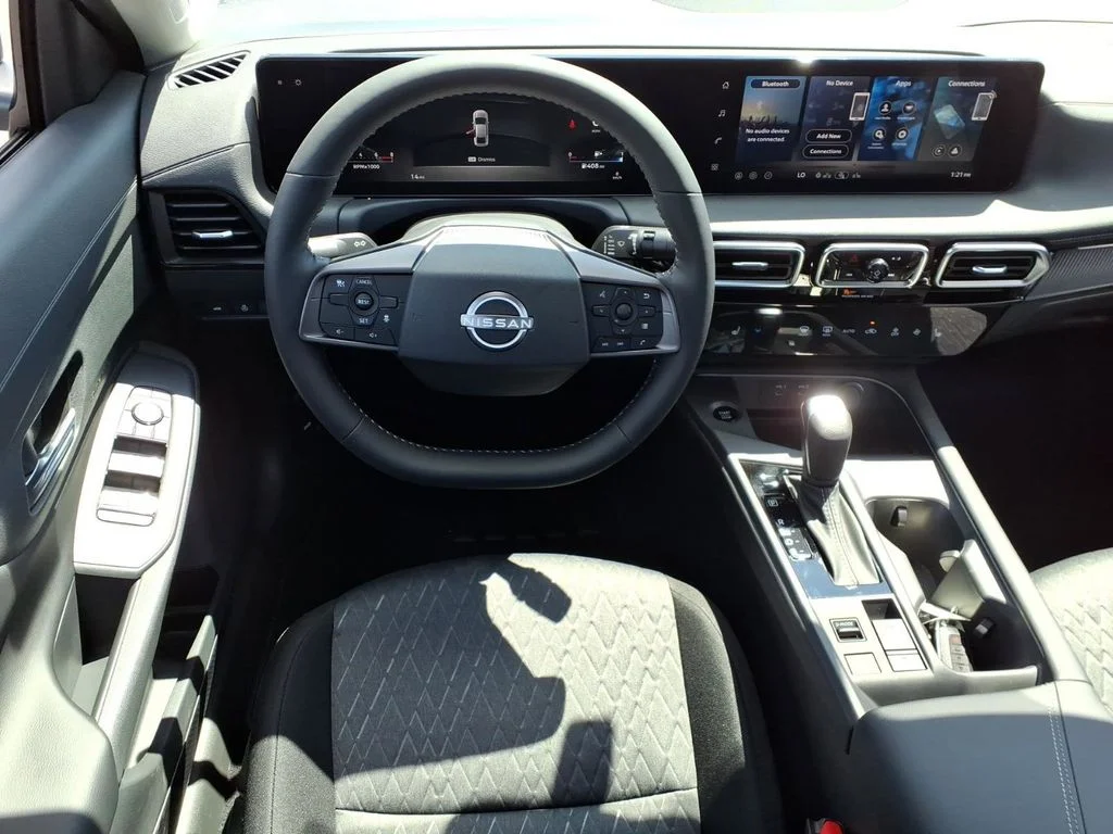 New 2026 Gun Metallic Nissan SV image 7