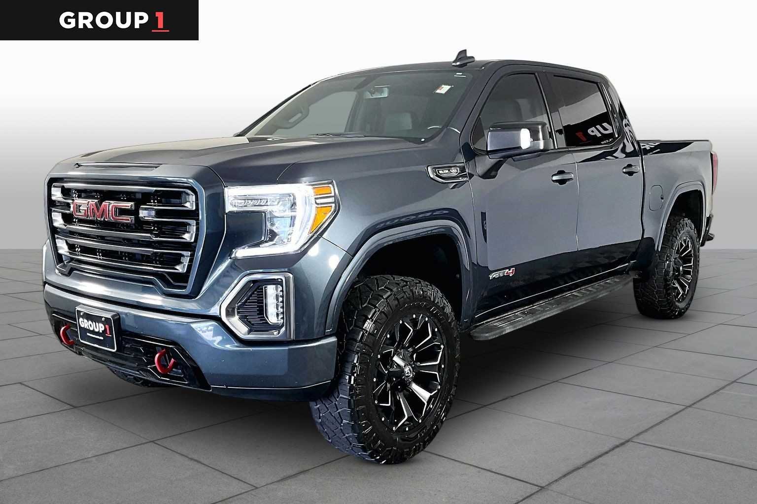 Used 2021 DARK SKY METALLIC GMC AT4 image 1