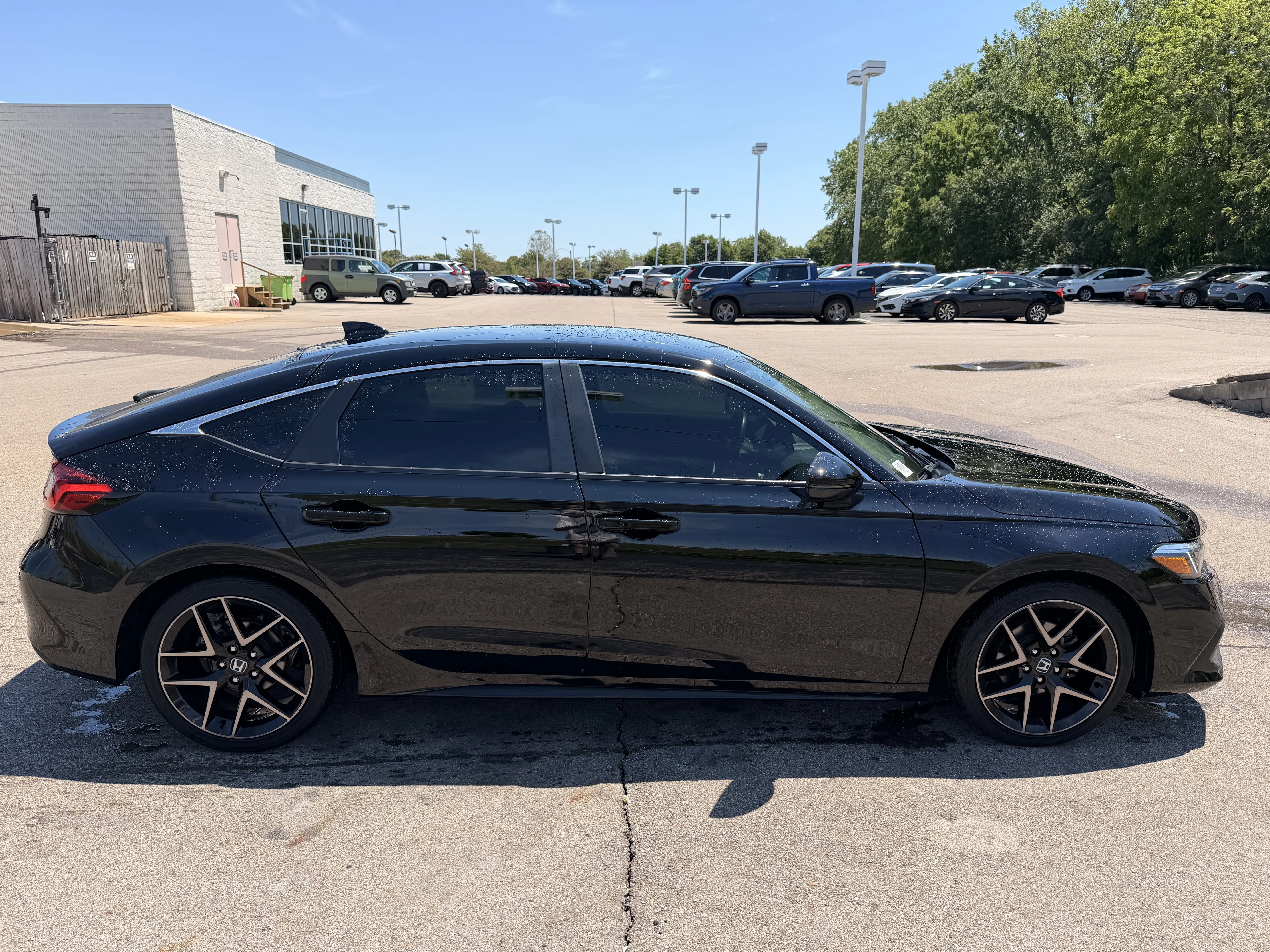 Certified Used 2024 Crystal Black Pearl Honda Sport Touring image 2
