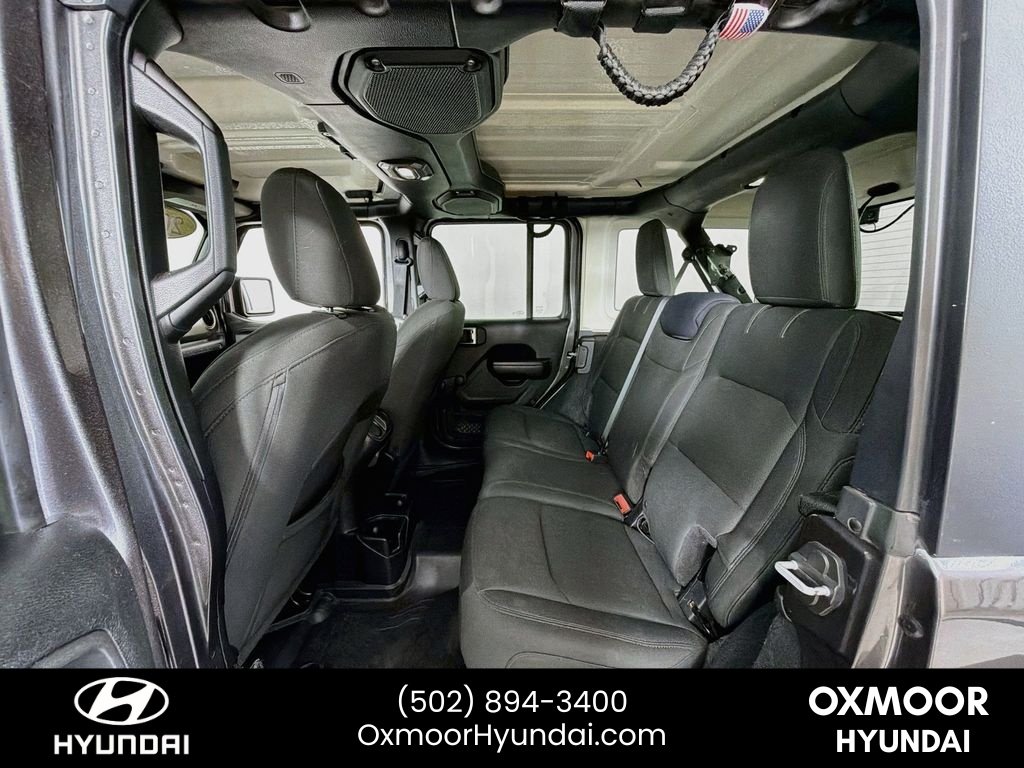 Used 2018 Granite Crystal Metallic Clearcoat Jeep Sport image 22