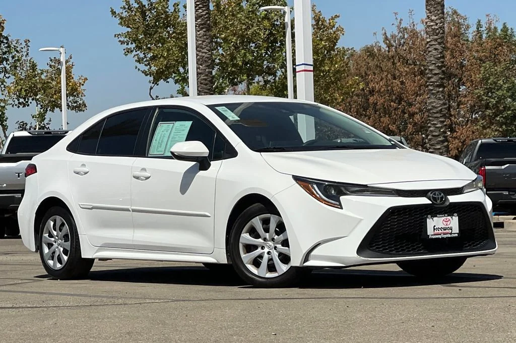 Certified Used 2021 White Toyota LE image 2