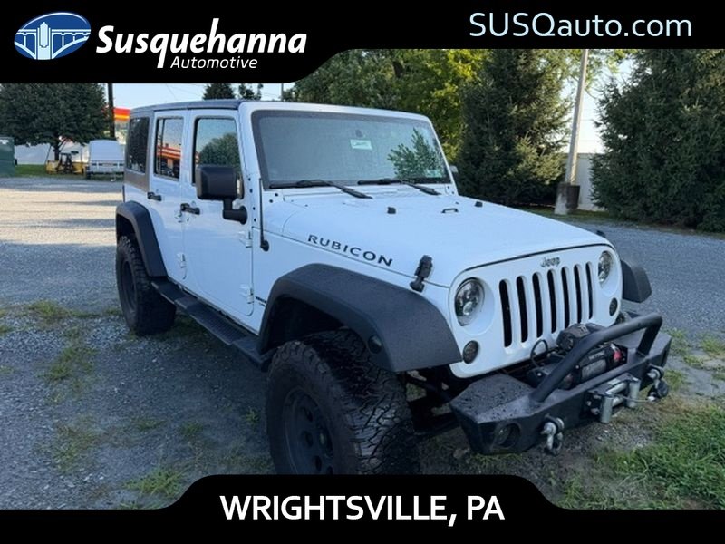 Used 2014 Bright White Clearcoat Jeep Rubicon image 1