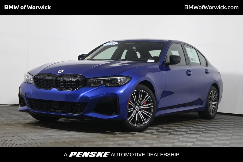 Used 2022 Blue Metallic BMW M340i xDrive image 1