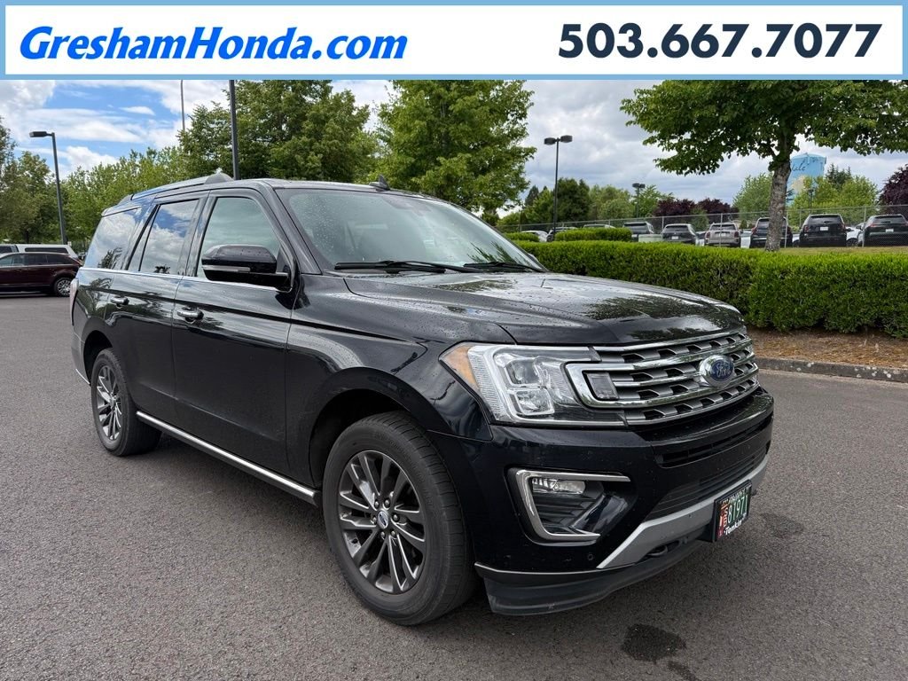 Used 2021 Agate Black Metallic Ford Limited image 1
