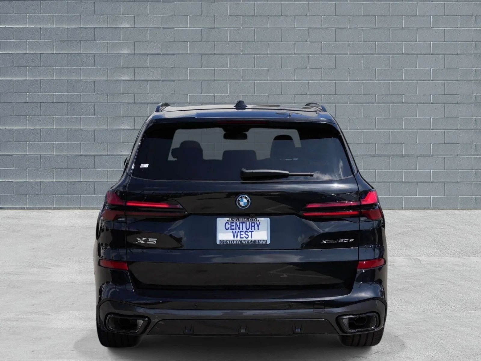 New 2026 Black Sapphire Metallic BMW xDrive50e image 4