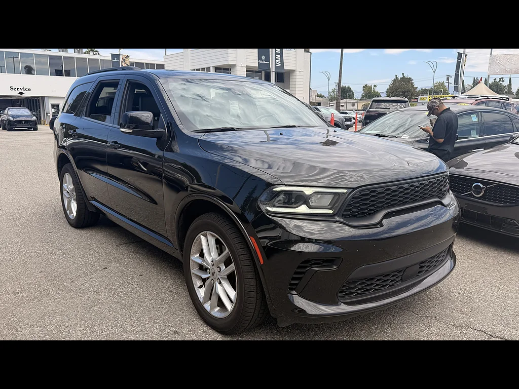 Used 2024 Diamond Black Clear Coat Dodge GT Plus image 1