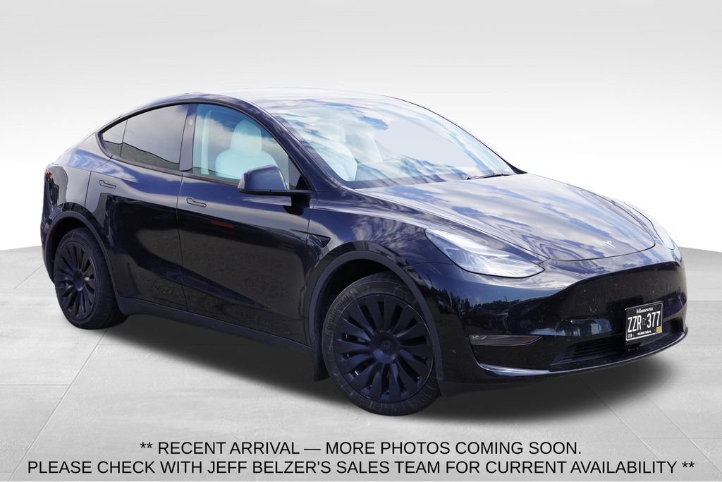 Used 2024 Solid Black Tesla Long Range image 1