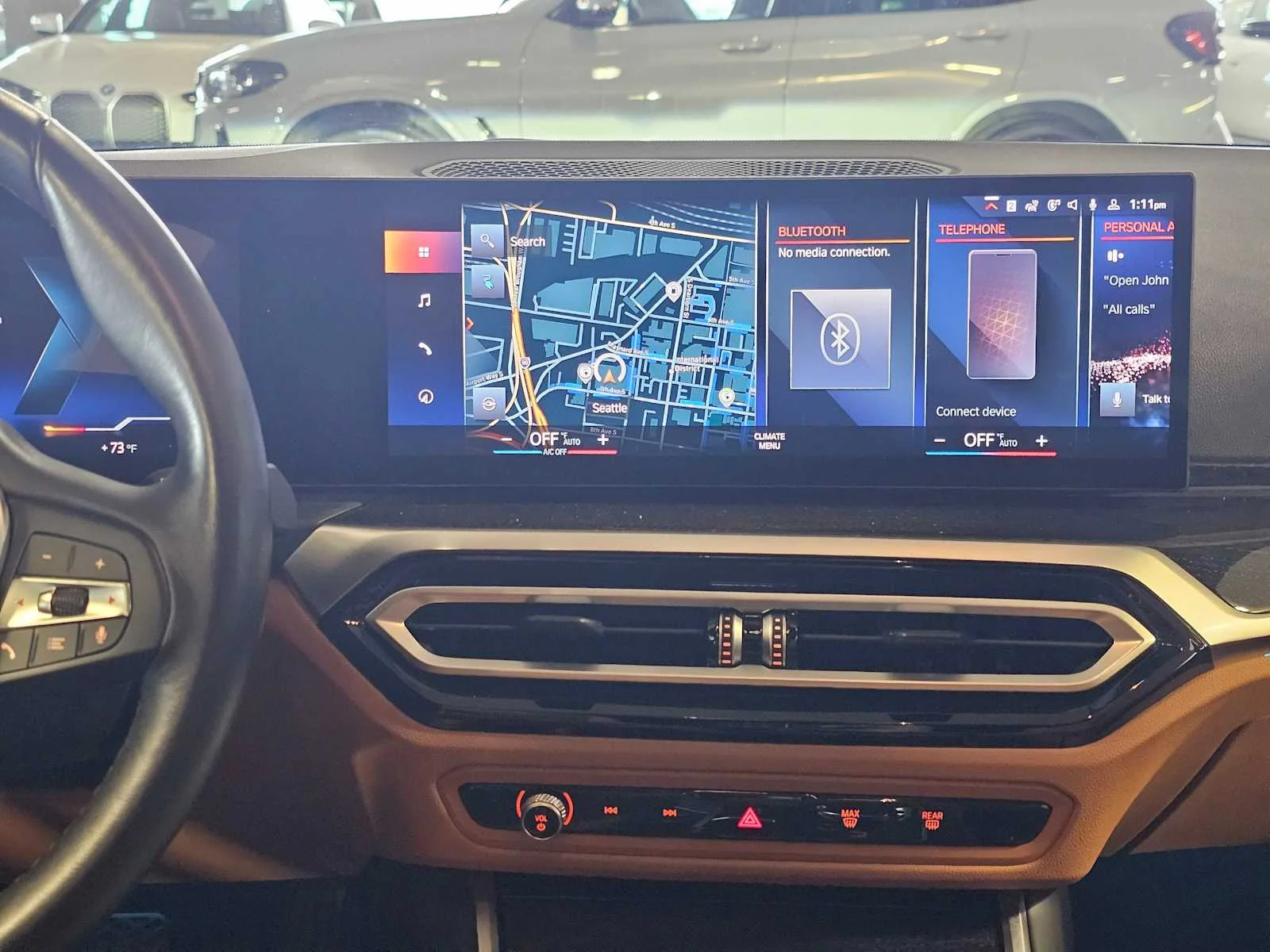 Certified Used 2023 Sunset Orange Metallic BMW eDrive35 image 13