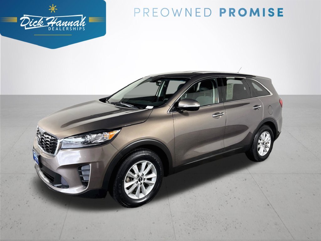 Used 2020 Brown Kia LX image 1