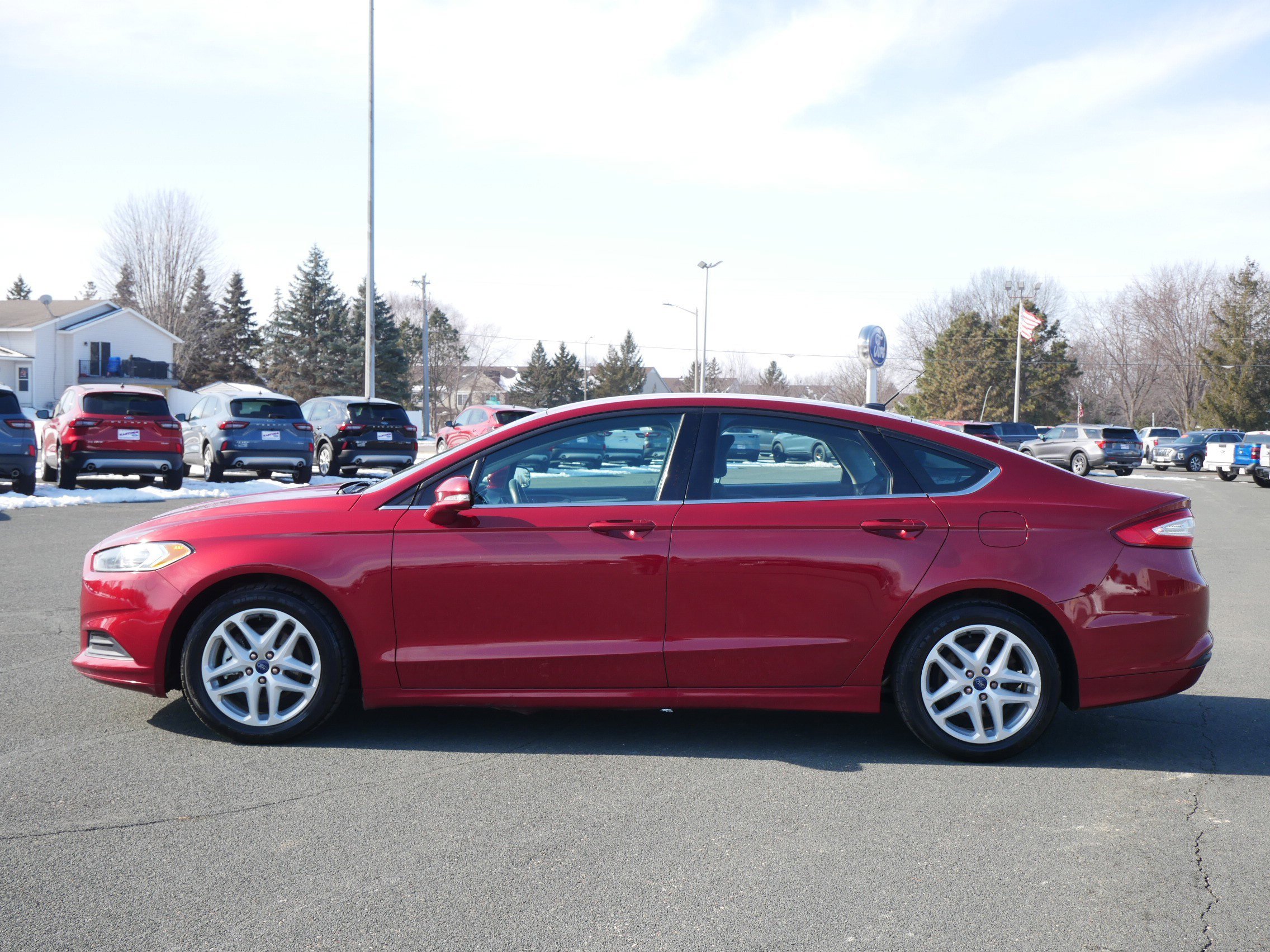 Used 2016 Ruby Red Metallic Tinted Clearcoat Ford SE image 2