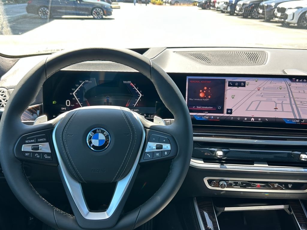 New 2026 Black Sapphire Metallic BMW xDrive50e image 17