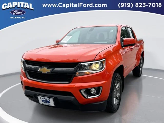Used 2019 Orange Chevrolet Z71 image 1