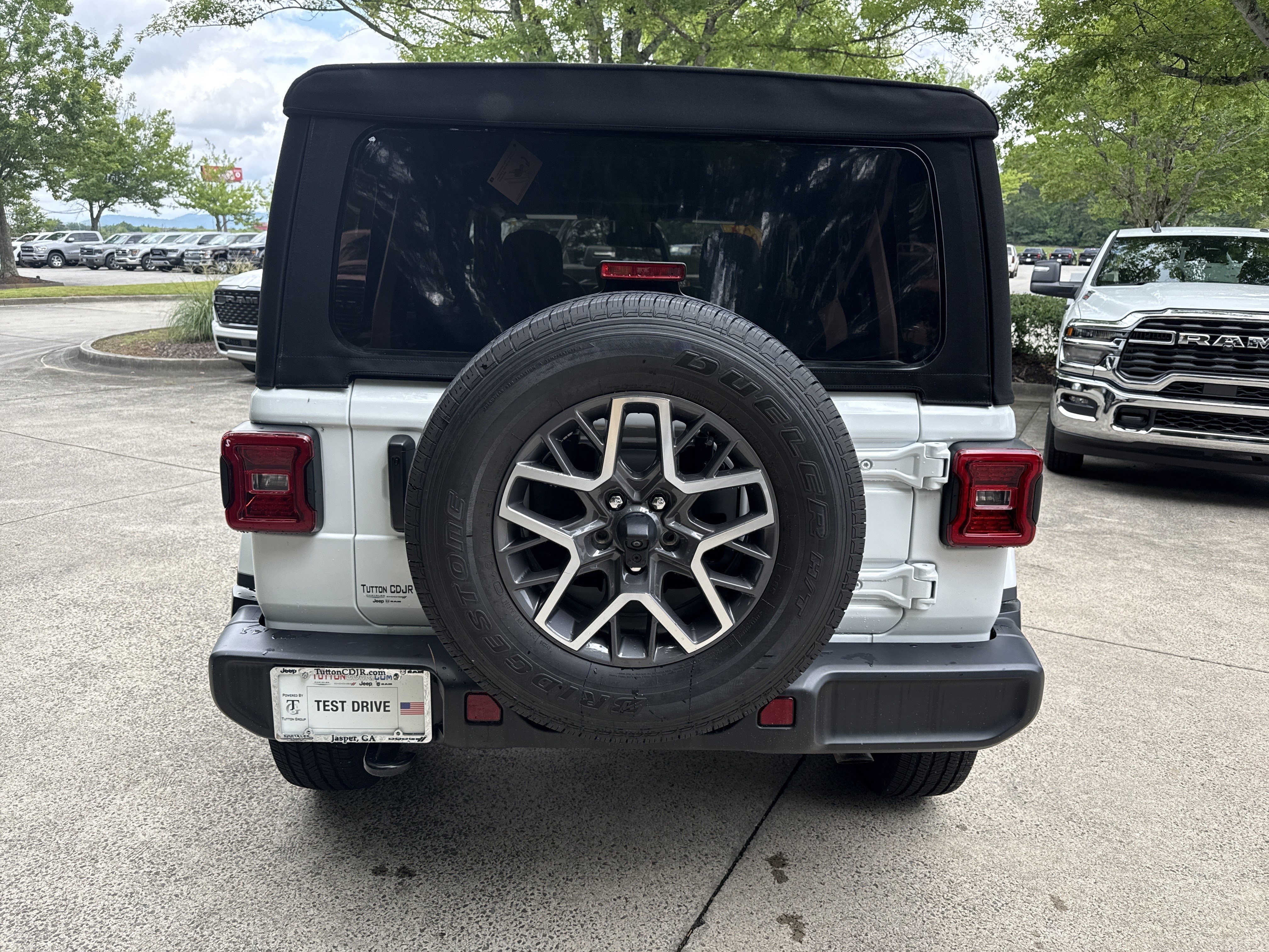 Used 2024 Bright White Clearcoat Jeep Sahara image 6