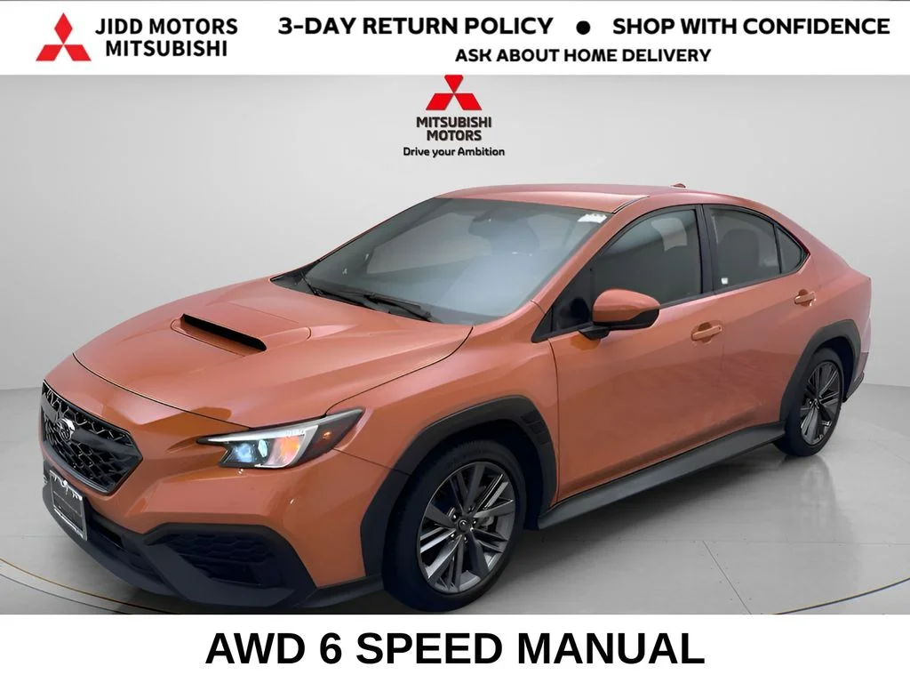 Used 2022 Orange Pearl Subaru  image 1