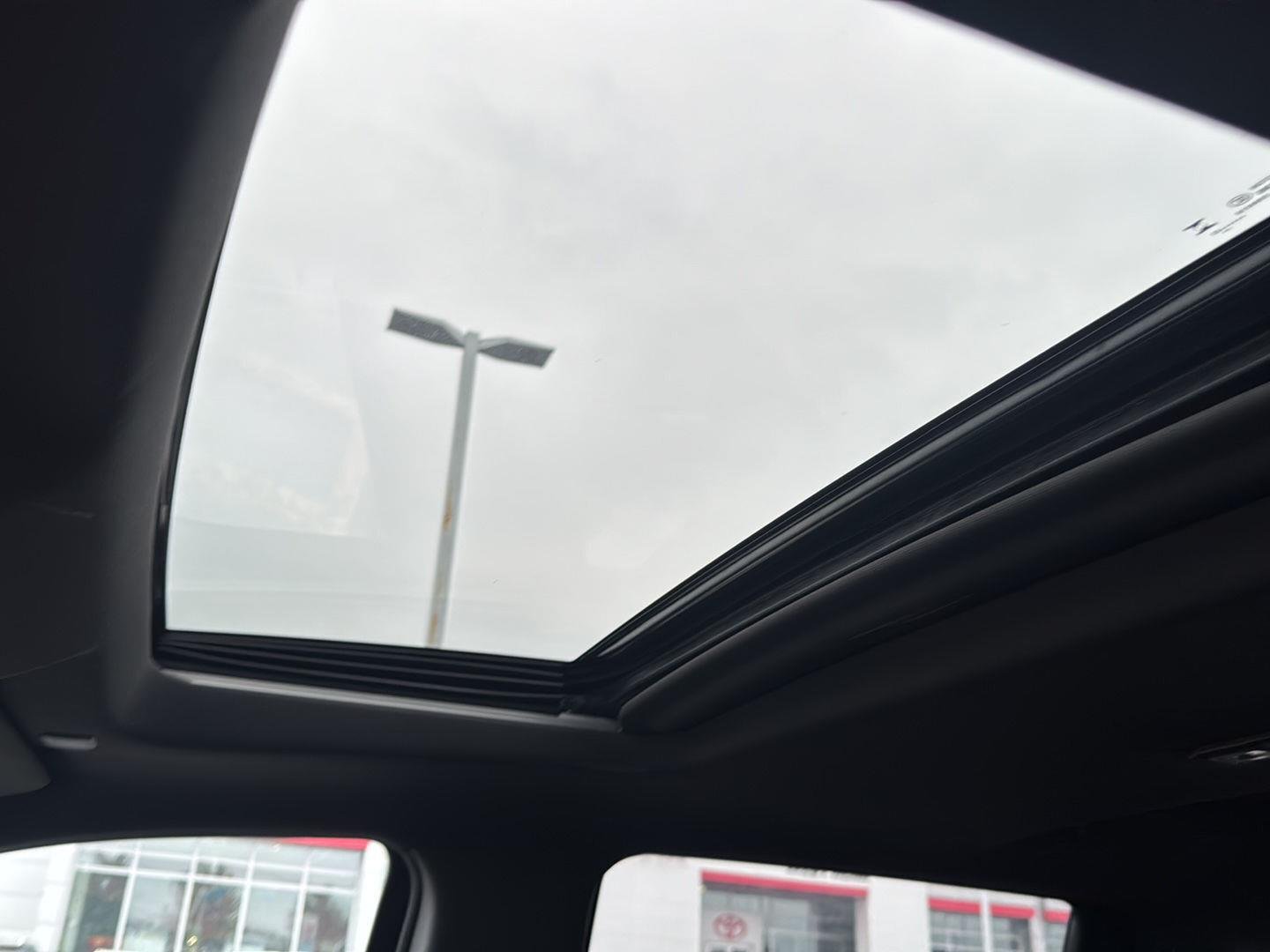 Used 2023 Titanium Rush Metallic GMC AT4 image 12