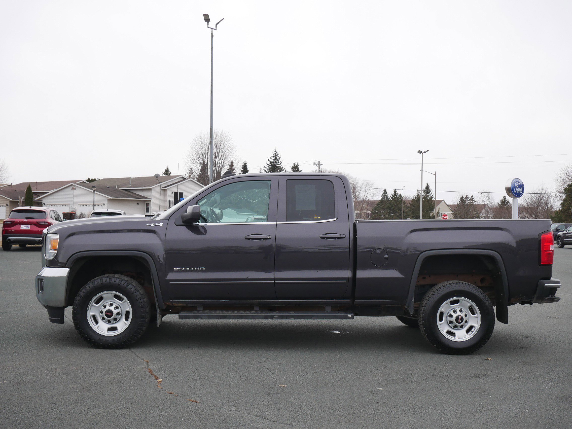 Used 2015 GMC Sierra 2500HD SLE with VIN 1GT22YEGXFZ536059 for sale in Hastings, Minnesota