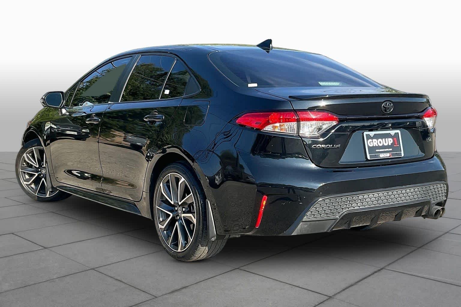 Used 2022 Black Sand Pearl Toyota SE image 12