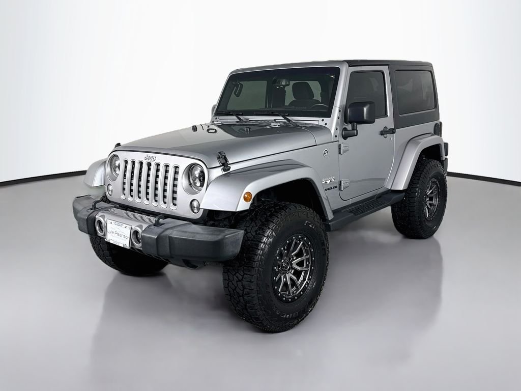 Used 2016 Silver Jeep Sahara image 1
