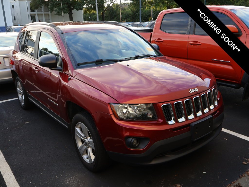 Used 2017 Red Jeep Sport image 1