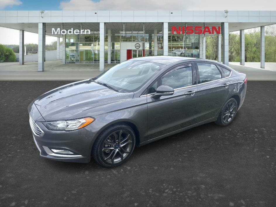 Used 2018 Magnetic Metallic Ford SE image 1
