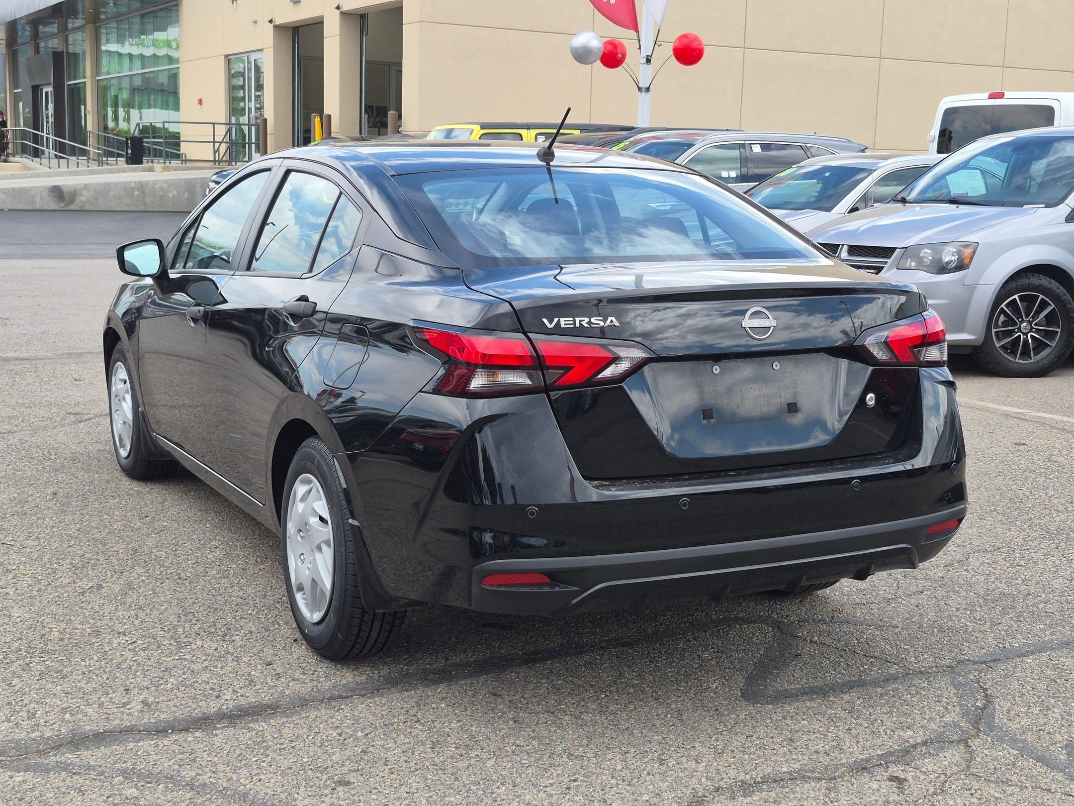 Certified Used 2024 Super Black Nissan S image 7