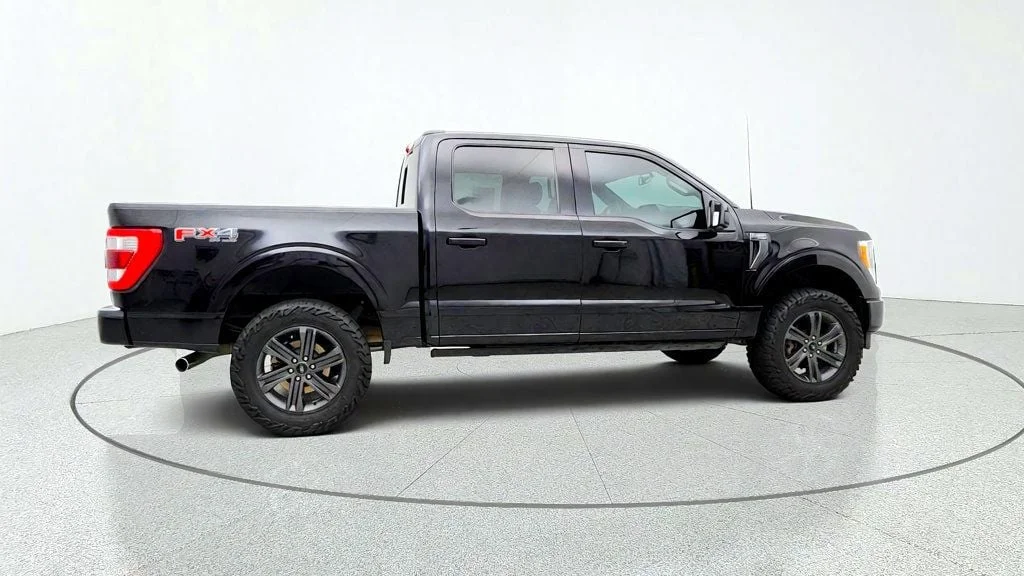 Used 2023 Agate Black Metallic Ford LARIAT 4WD SuperCrew 5.5