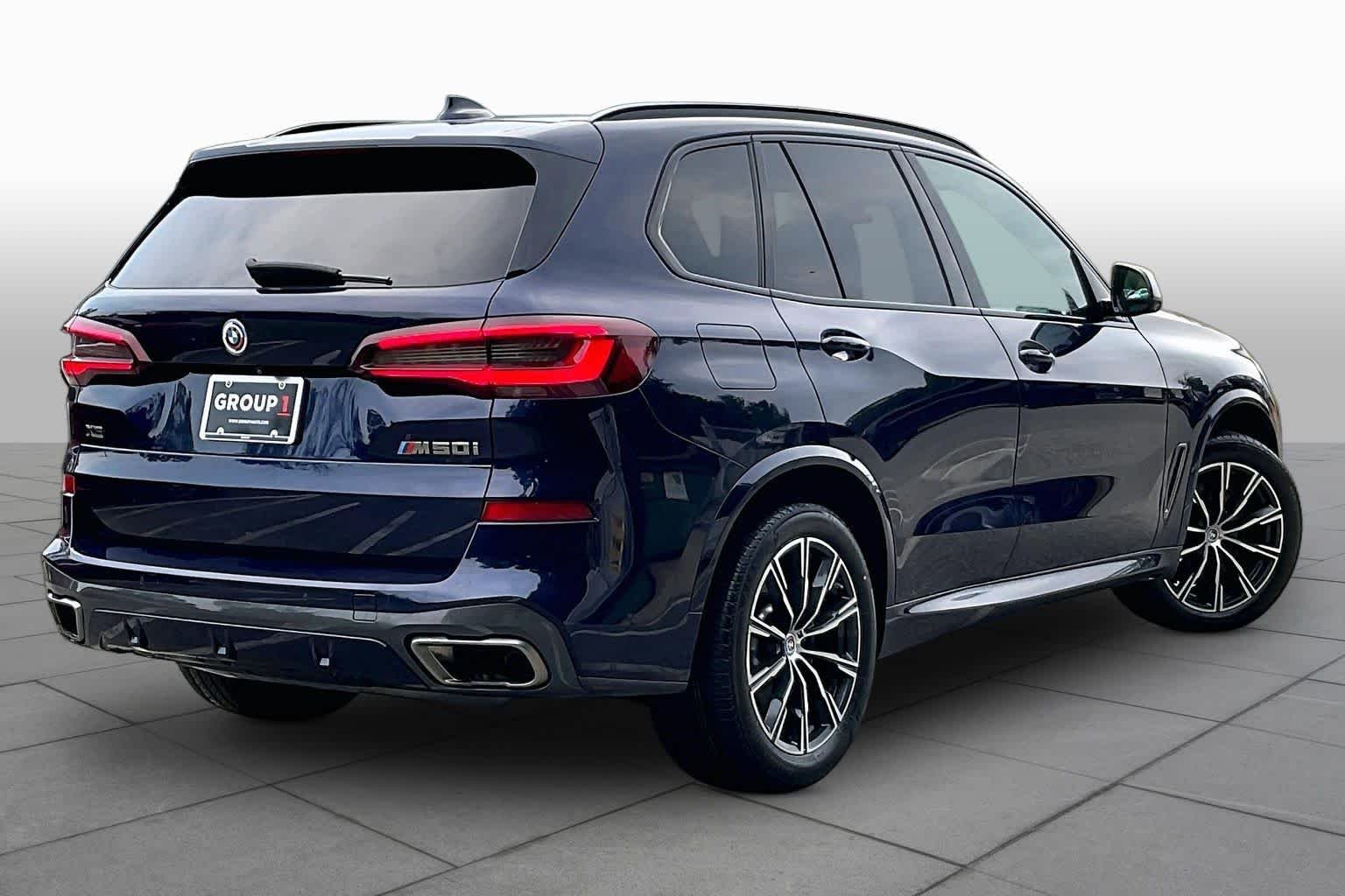 Used 2023 Tanzanite Blue II Metallic BMW M50i image 12