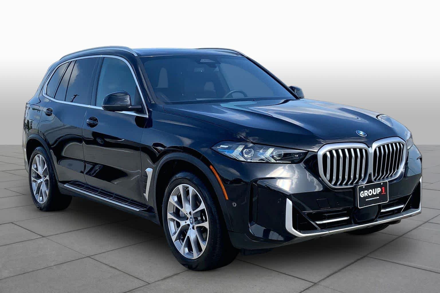 Used 2025 Black Sapphire Metallic BMW xDrive50e image 3