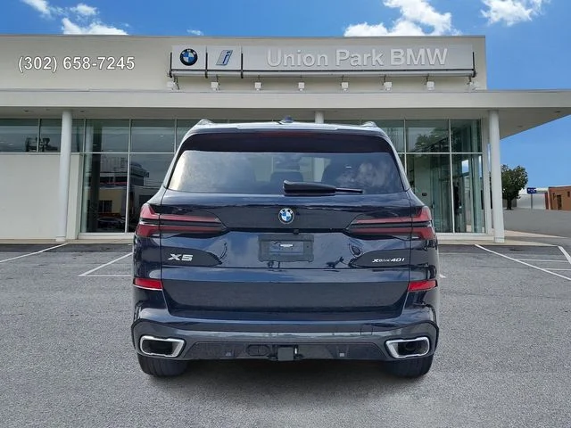 Certified Used 2024 Carbon Black Metallic BMW xDrive40i image 5