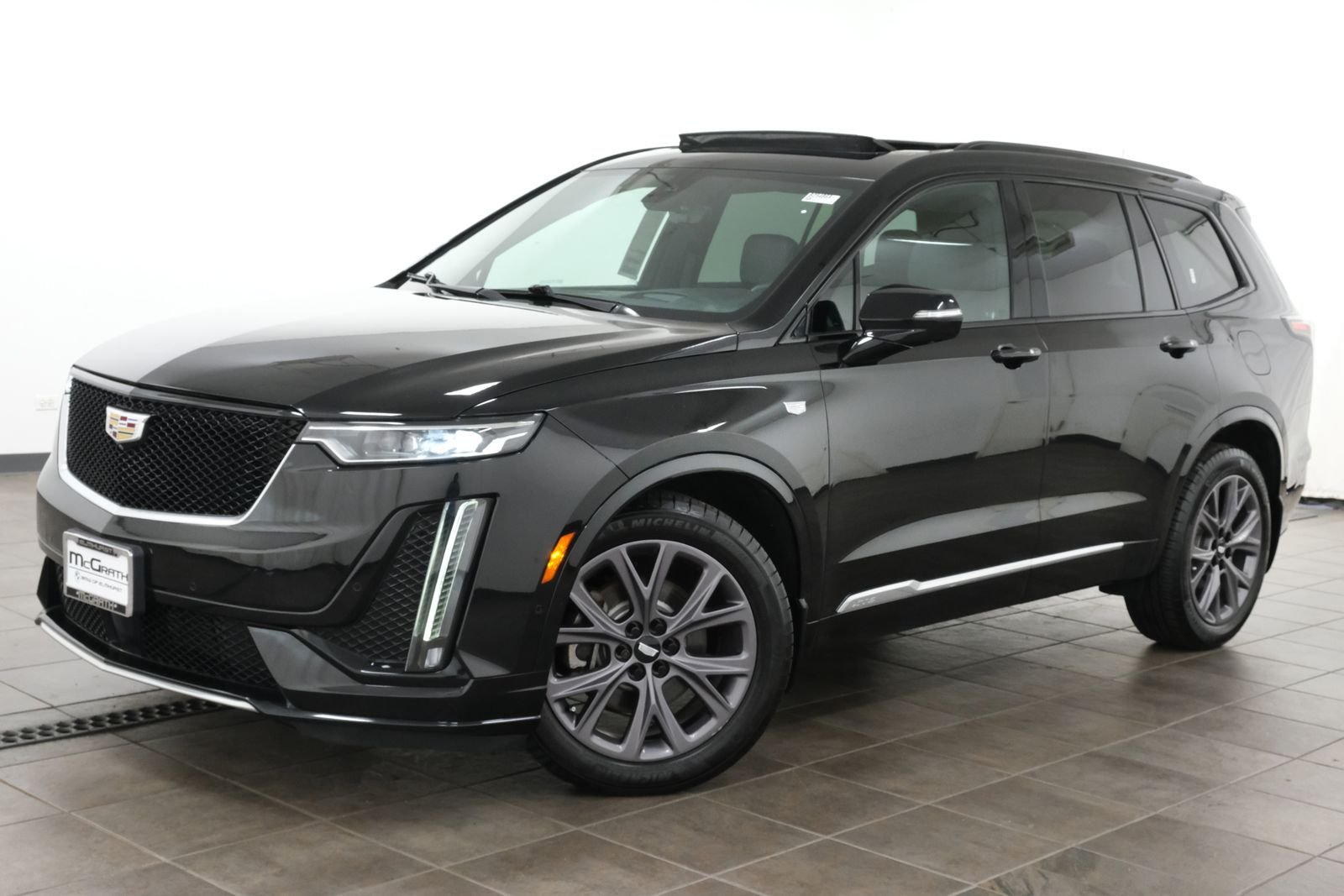 Used 2020 Stellar Black Metallic Cadillac Sport image 1