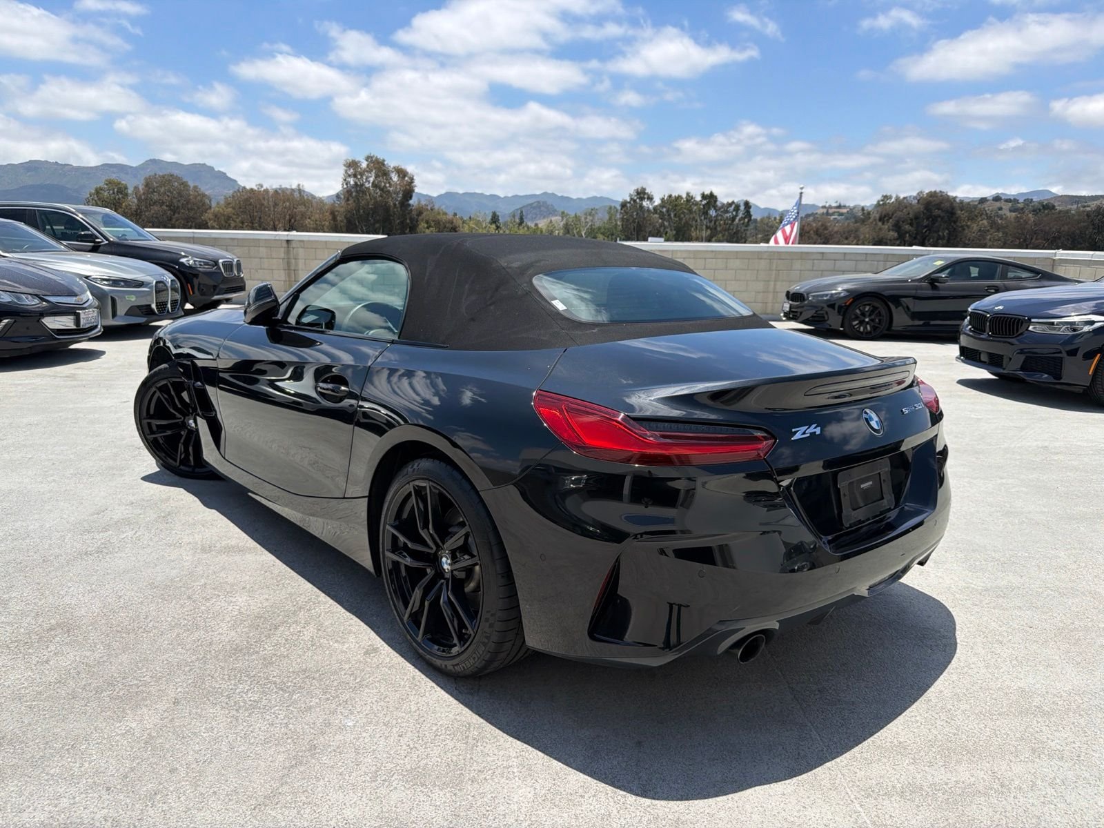 Certified Used 2021 Black Sapphire Metallic BMW sDrive30i image 2