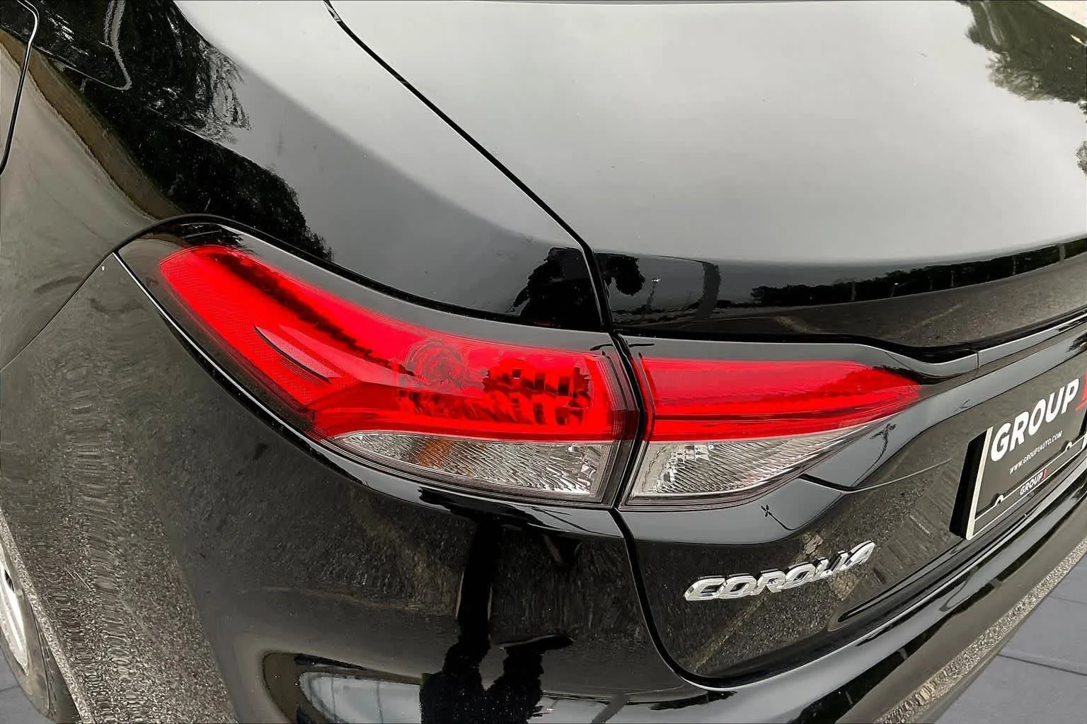 Used 2024 Midnight Black Metallic Toyota LE image 27