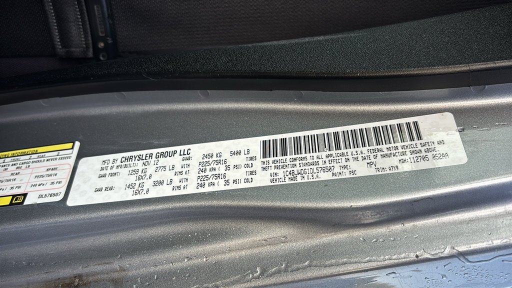 Used 2013 Billet Clearcoat Metallic Jeep Unlimited Sport image 28