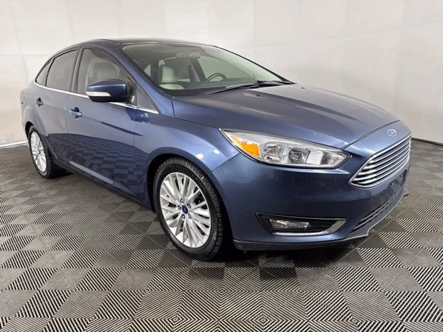 Certified Used 2018 Blue Metallic Ford Titanium image 1
