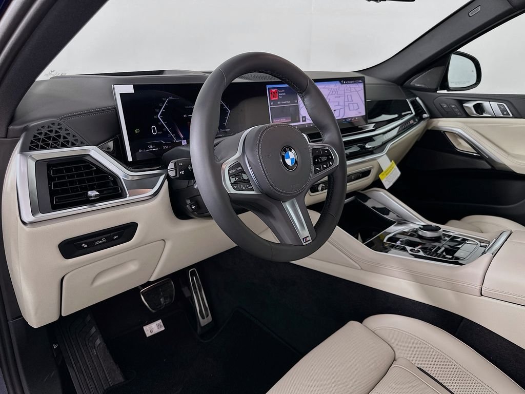 Used 2026 Tanzanite Blue II Metallic BMW xDrive40i image 9