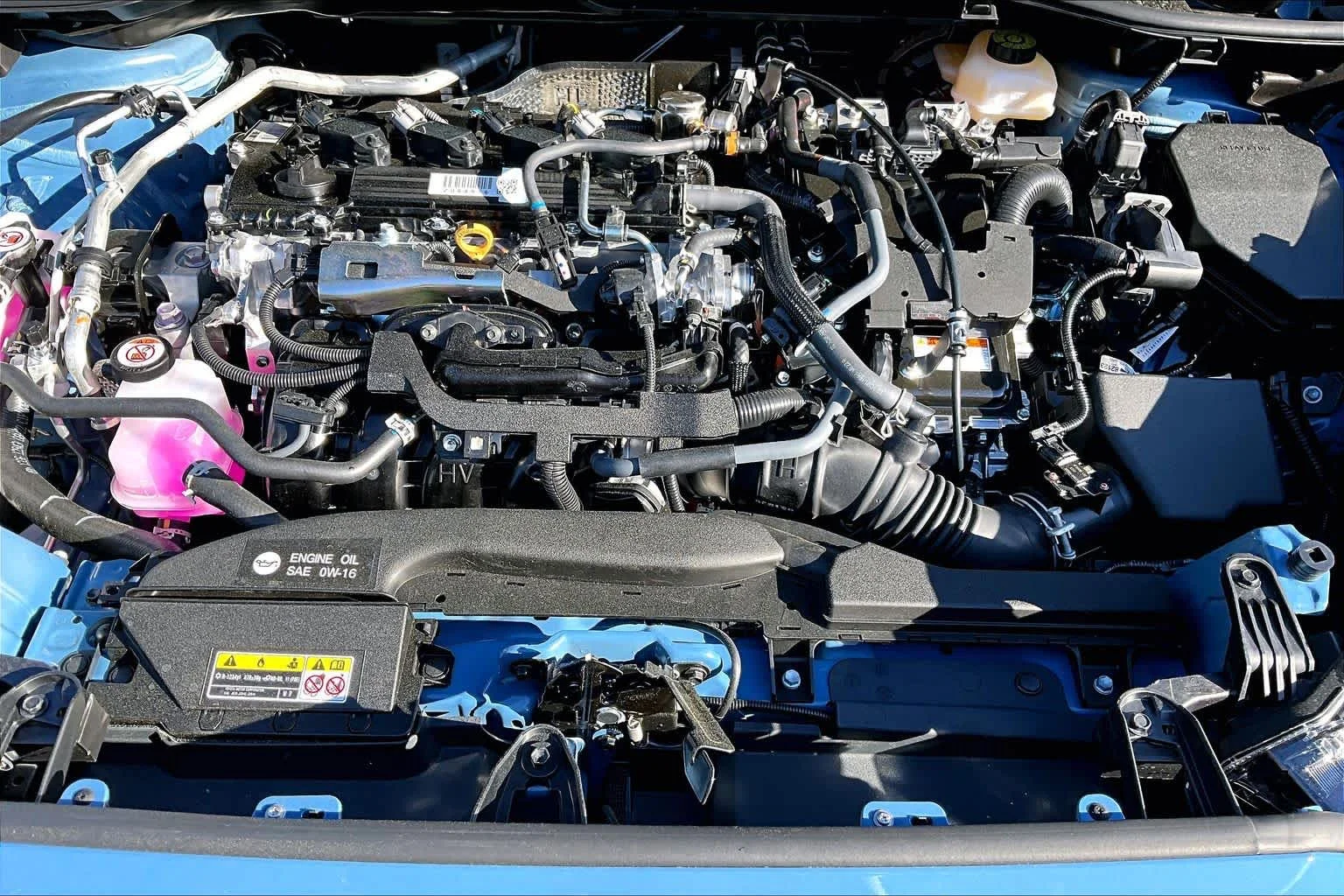 New 2026 Cavalry Blue/Jet Black Toyota Hybrid SE image 16