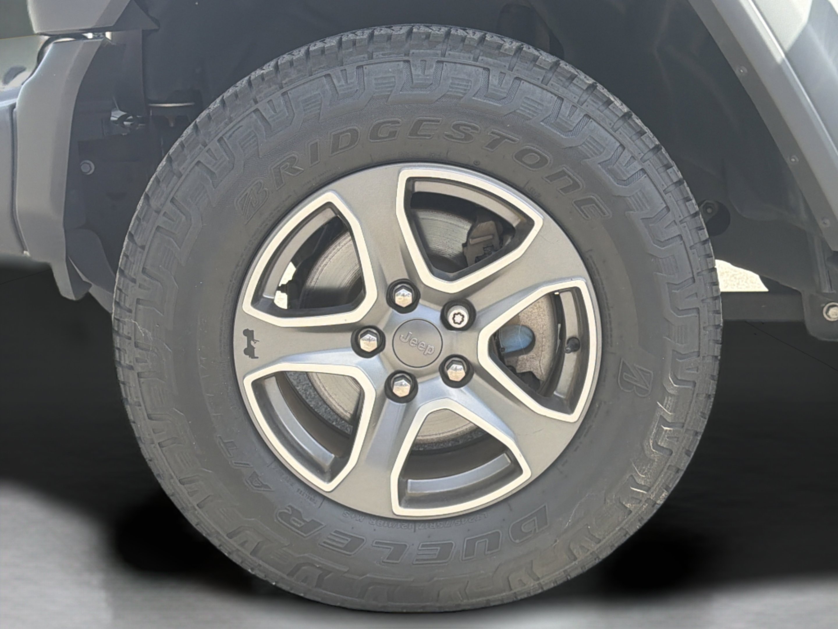 Used 2018 Granite Crystal Metallic Clearcoat Jeep Sport S image 24