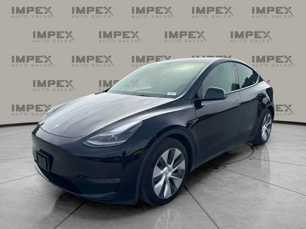 Used 2022 Black Tesla Performance image 1