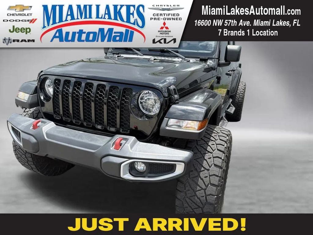 Used 2023 Black Clearcoat Jeep Sport S image 1