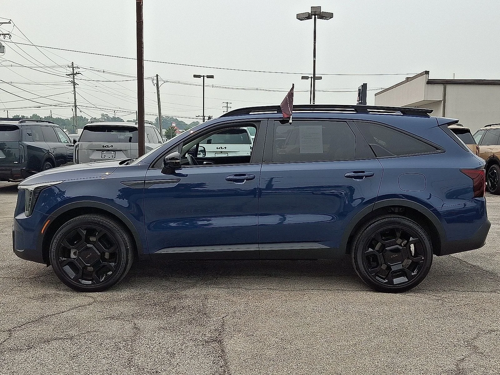 Certified Used 2025 Black Kia X-Line EX image 4