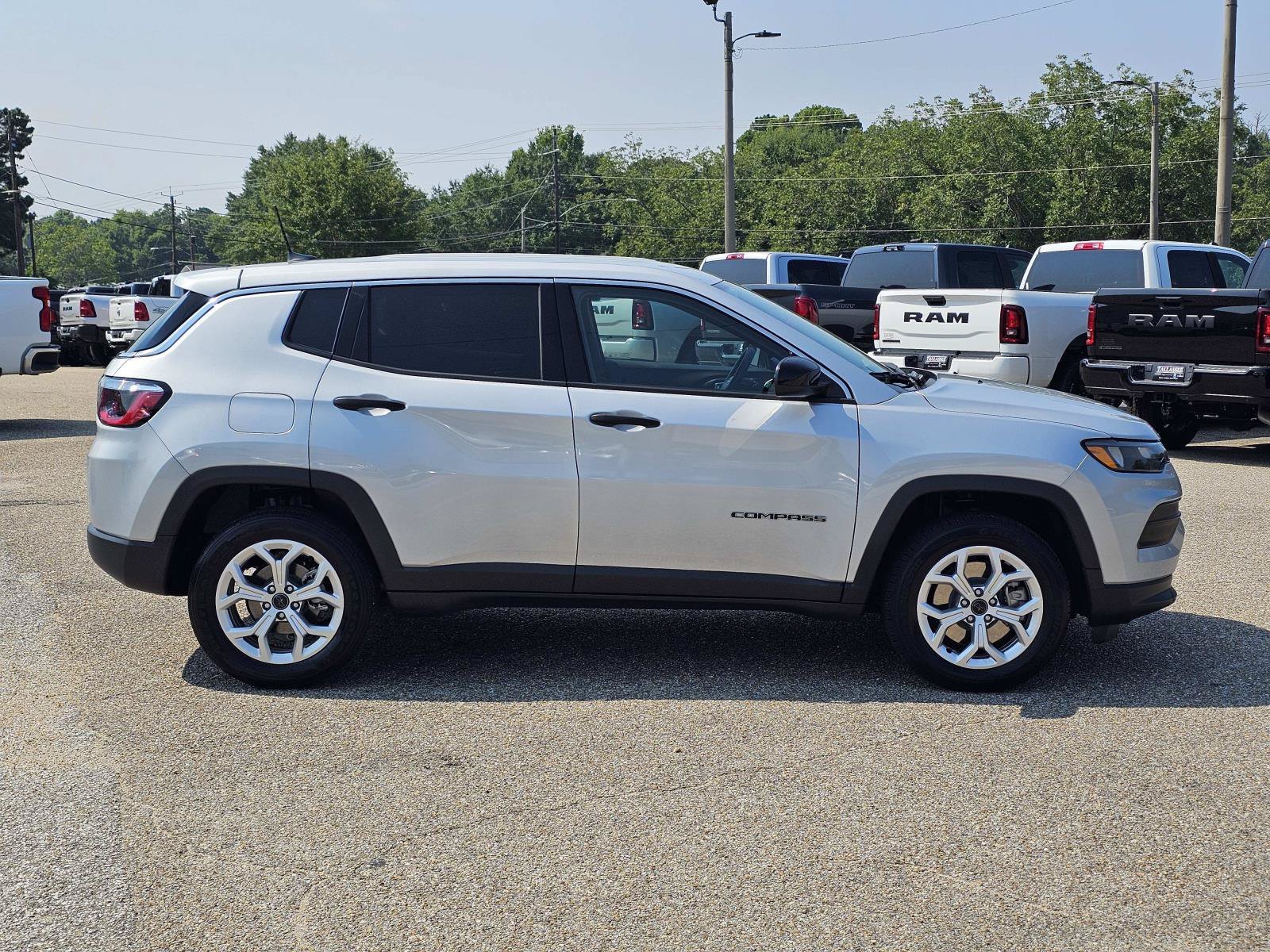 Used 2025 Silver Zynith Metallic Clearcoat Jeep Sport image 7